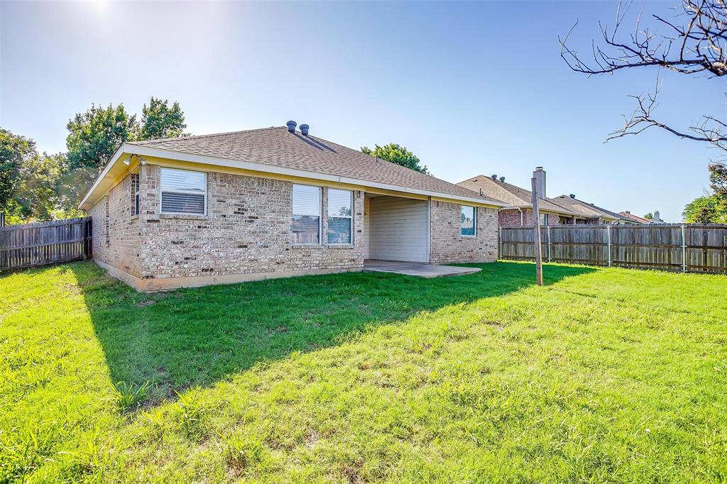 543 Thistle Meade Circle Burleson, TX 76028 - Photo 23 of 23 a front view of house with yard and green space