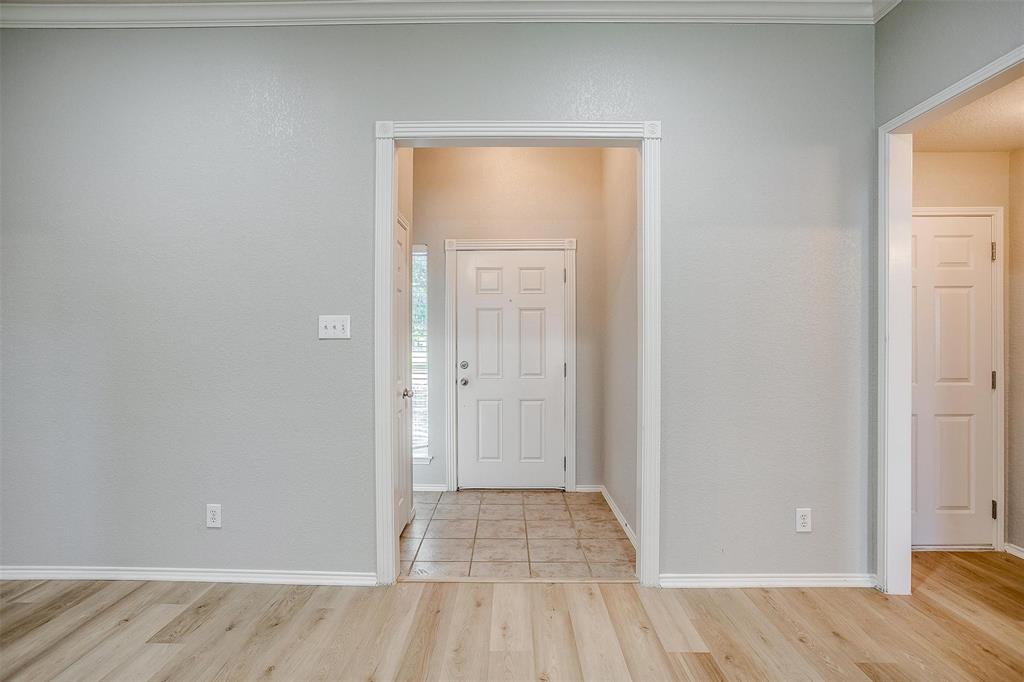 543 Thistle Meade Circle Burleson, TX 76028 - Photo 5 of 23 a view of an empty room and window