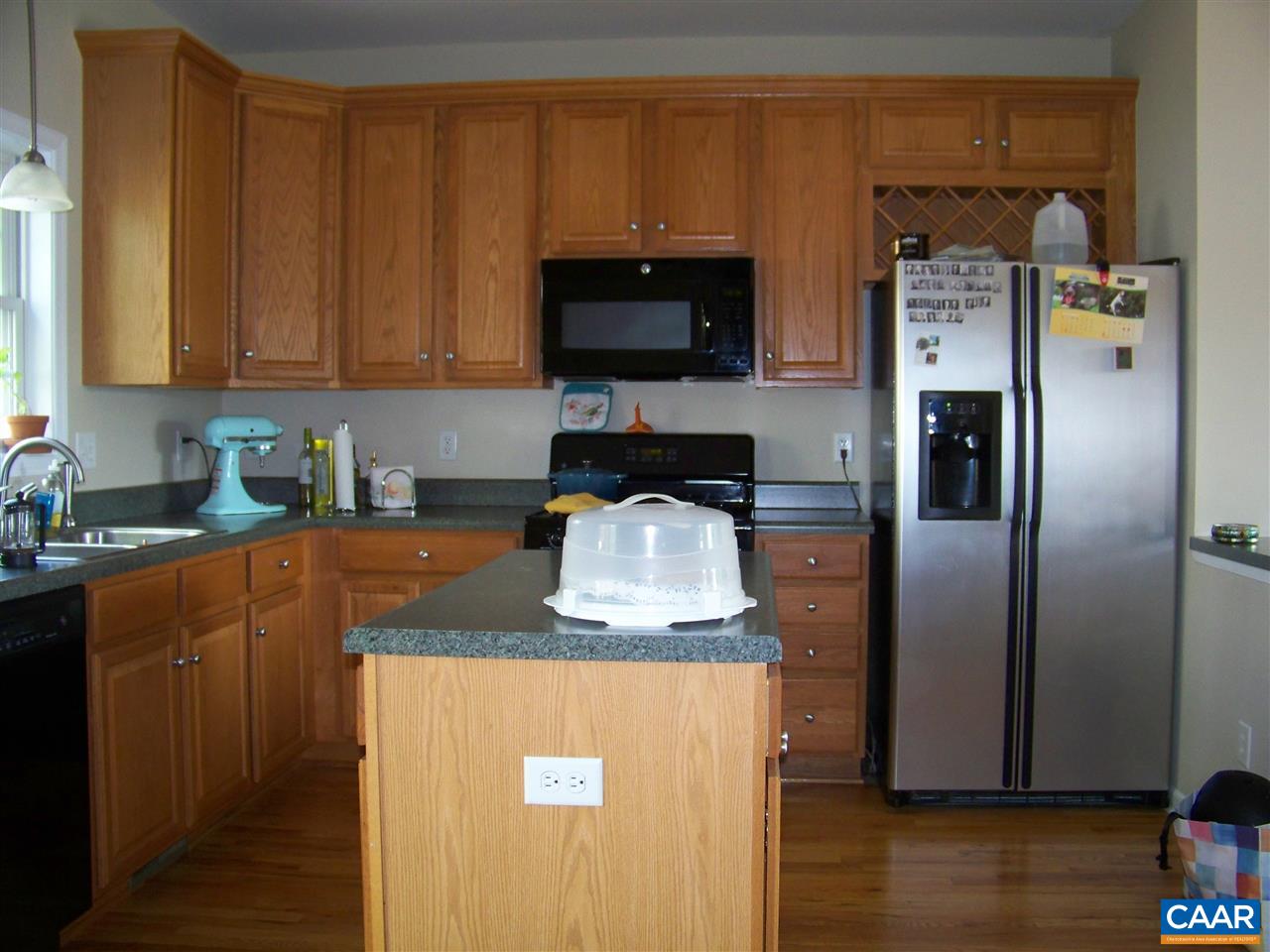 131 Burnet Street Charlottesville, VA 22902 - Photo 20 of 38 a kitchen with stainless steel appliances granite countertop a refrigerator a stove top oven a sink and dishwasher