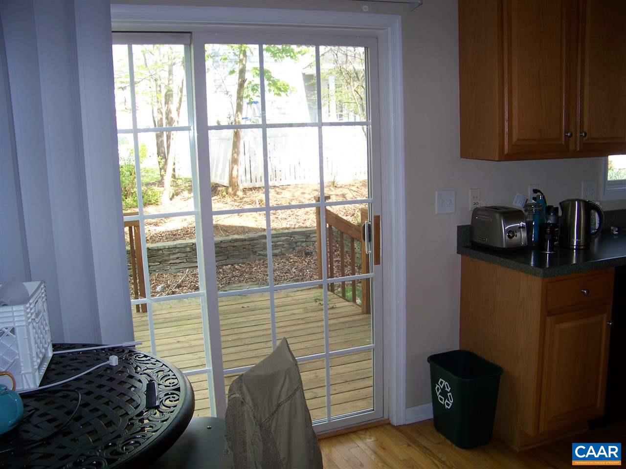 131 Burnet Street Charlottesville, VA 22902 - Photo 21 of 38 a bedroom with a bed and a window