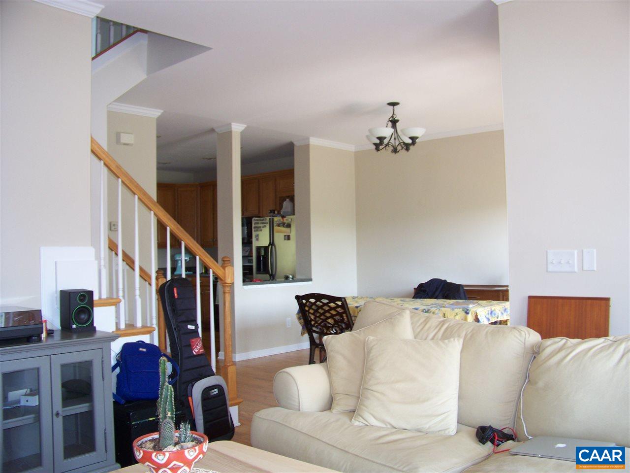 131 Burnet Street Charlottesville, VA 22902 - Photo 23 of 38 a bedroom with furniture and wooden floor