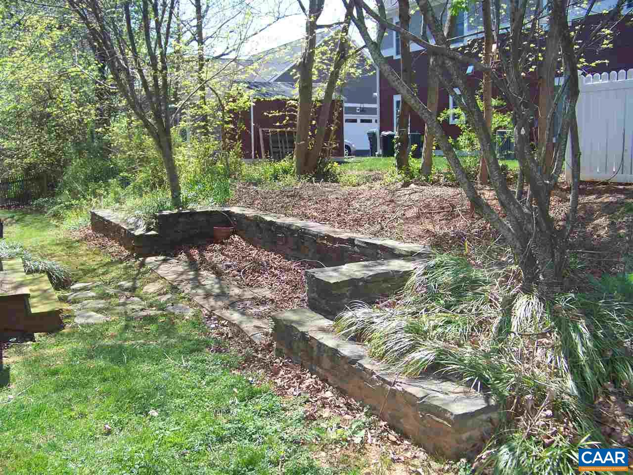 131 Burnet Street Charlottesville, VA 22902 - Photo 30 of 38 a backyard of a house with lots of green space