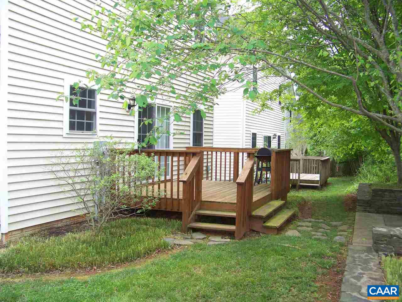 131 Burnet Street Charlottesville, VA 22902 - Photo 31 of 38 a view of a house with backyard and a garden