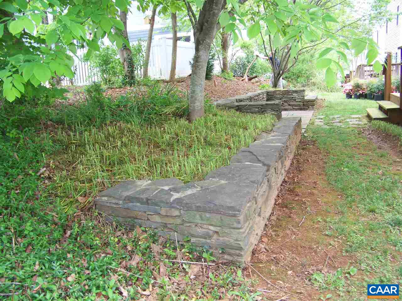 131 Burnet Street Charlottesville, VA 22902 - Photo 34 of 38 a view of a yard with plants and trees
