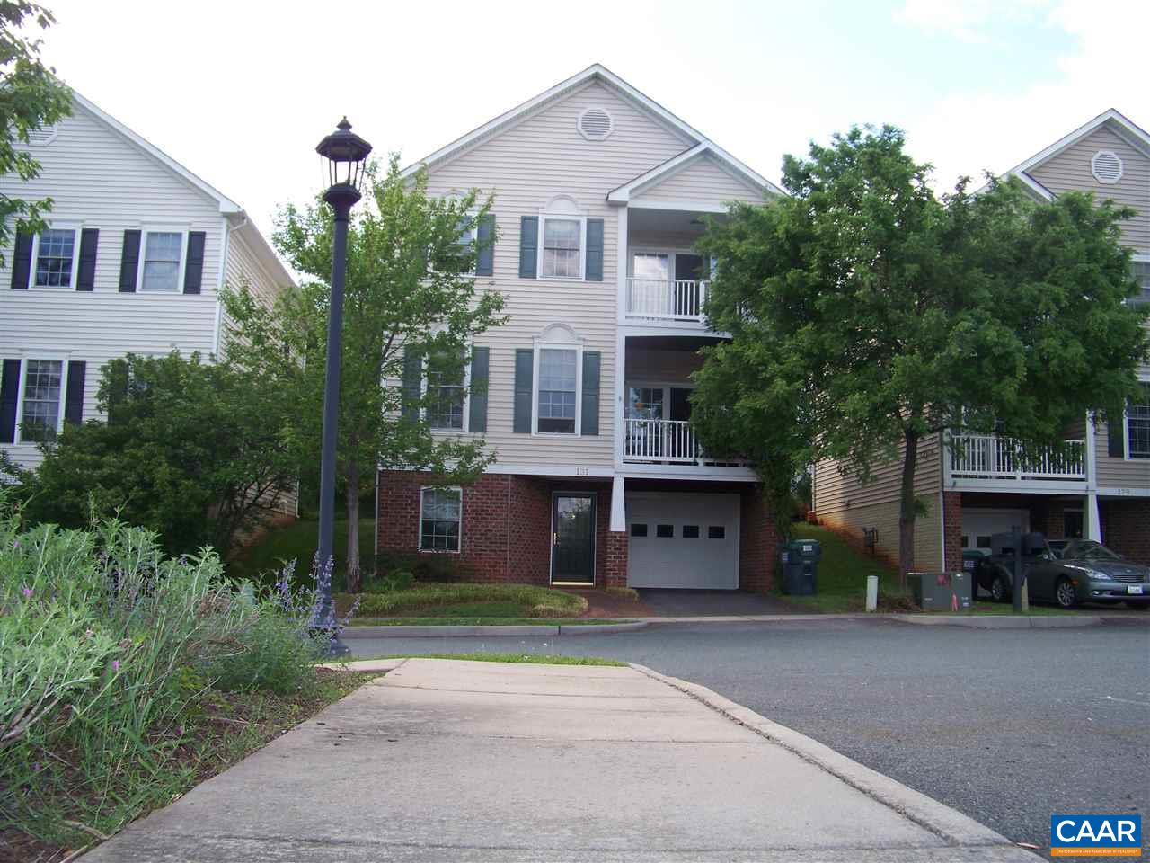 131 Burnet Street Charlottesville, VA 22902 - Photo 4 of 38 a front view of a house with a yard and a garage
