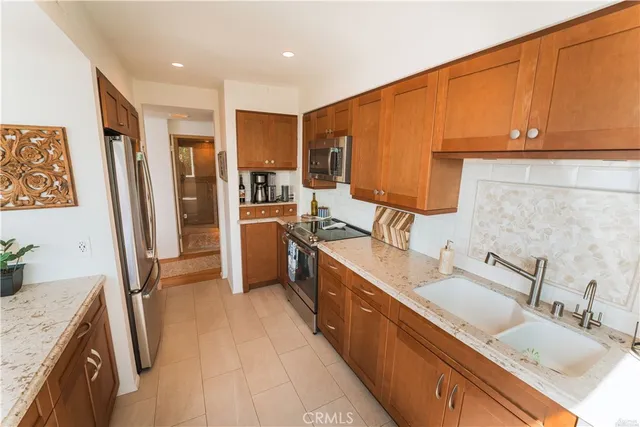 a kitchen with a stove and a microwave