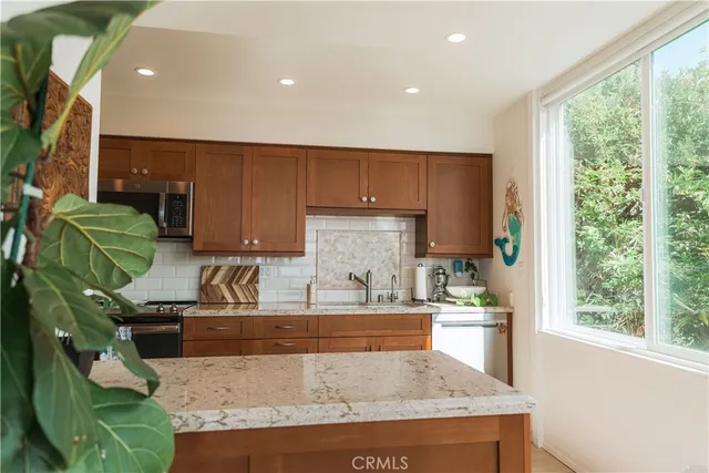 a view of a bathroom with a tub and sink