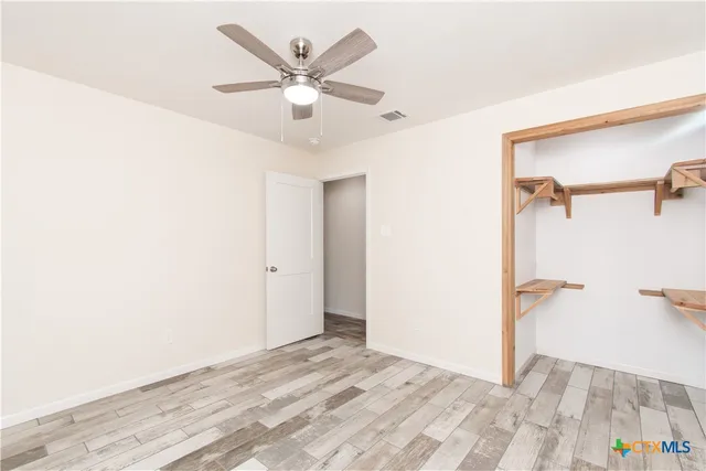 a view of a livingroom with a hardwood floor