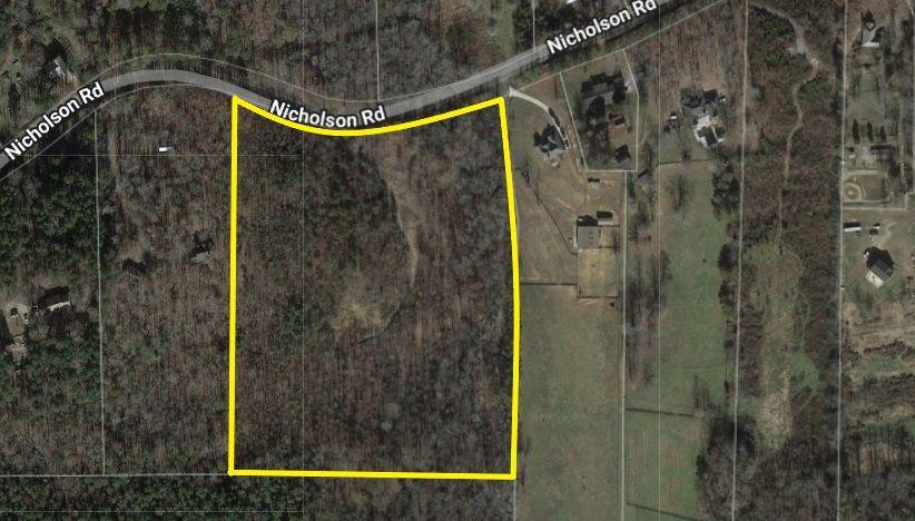 8205 Nicholson Road Cumming, GA 30028 - Photo 5 of 10 a bathroom with a shower and a mirror