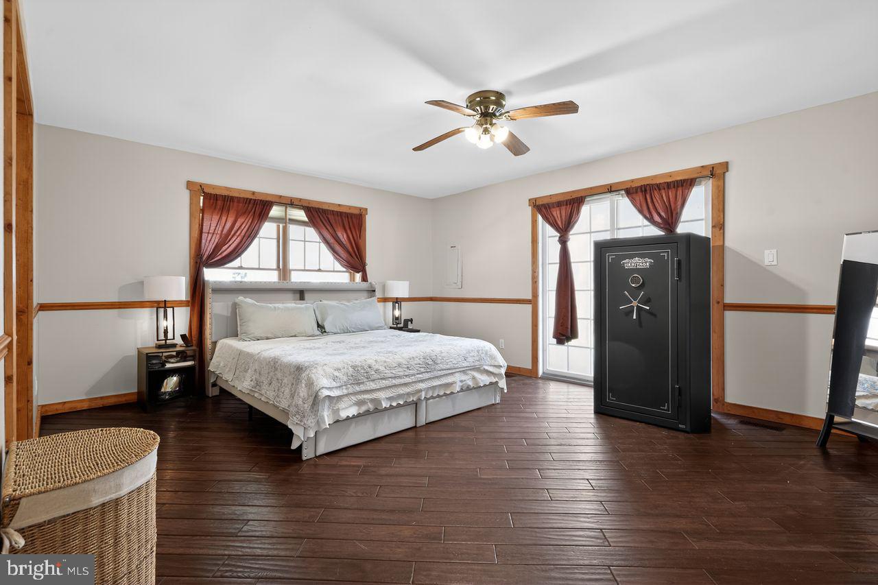 21 Mill Road Shamong, NJ 08088 - Photo 27 of 52 a bedroom with a bed dresser and a window