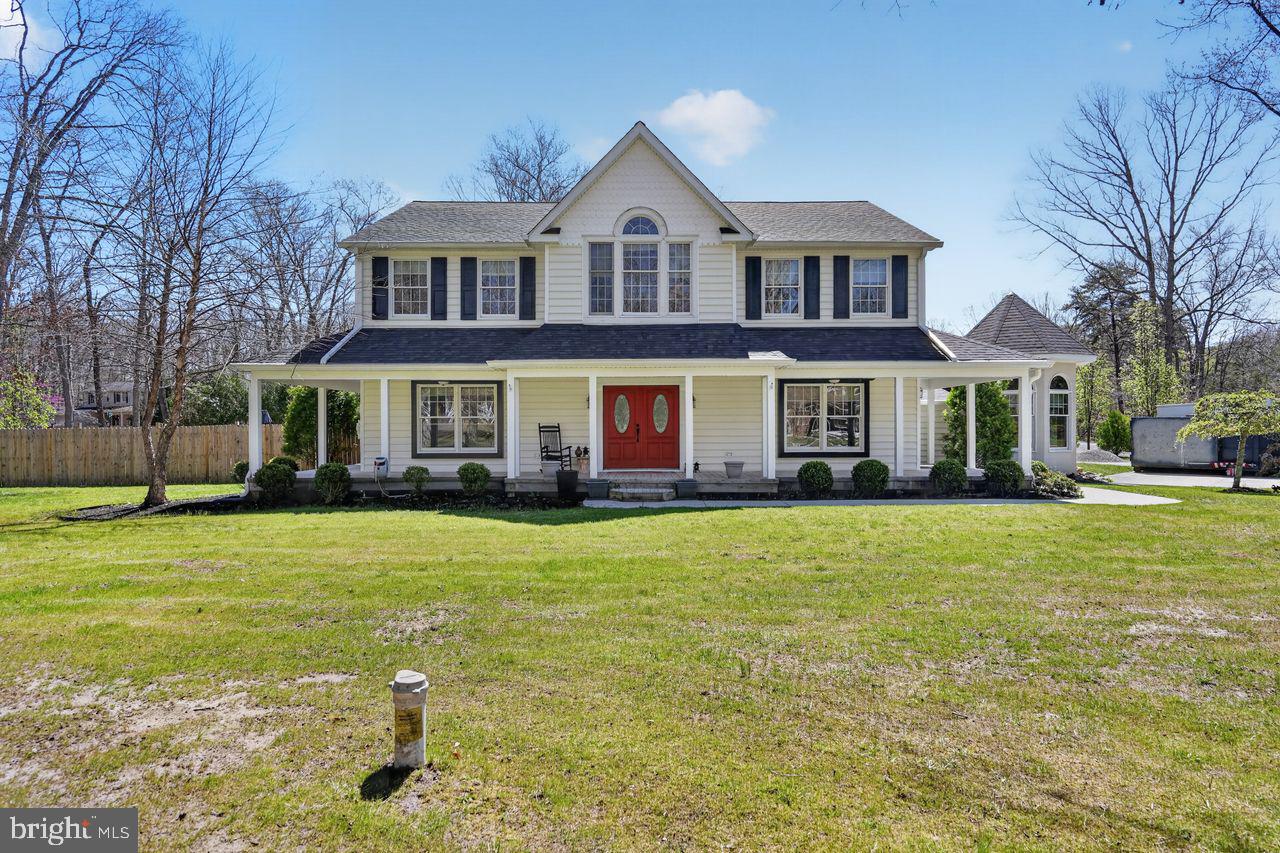 21 Mill Road Shamong, NJ 08088 - Photo 3 of 52 a front view of a house with a yard