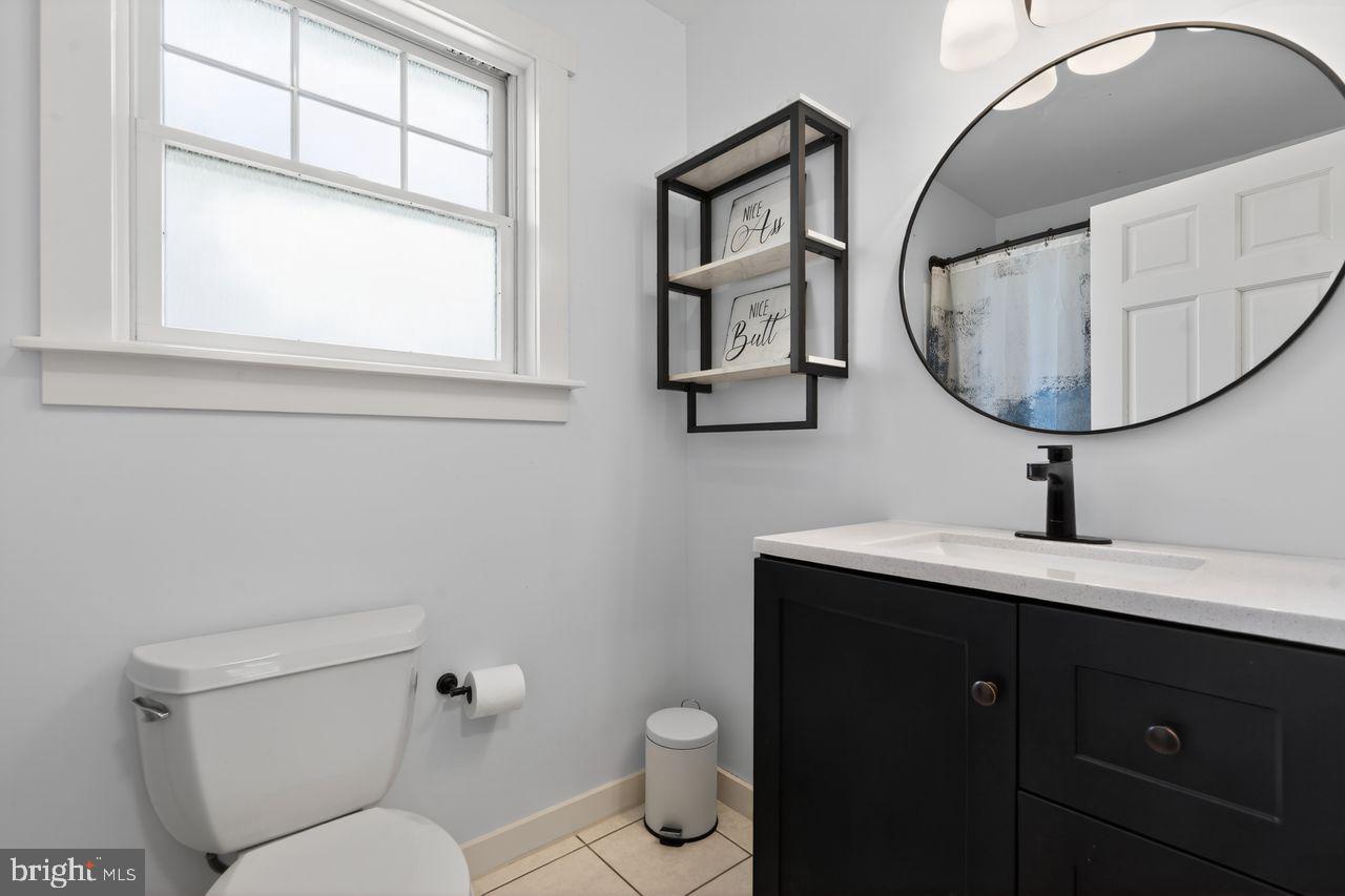 21 Mill Road Shamong, NJ 08088 - Photo 35 of 52 a bathroom with a toilet a sink and mirror