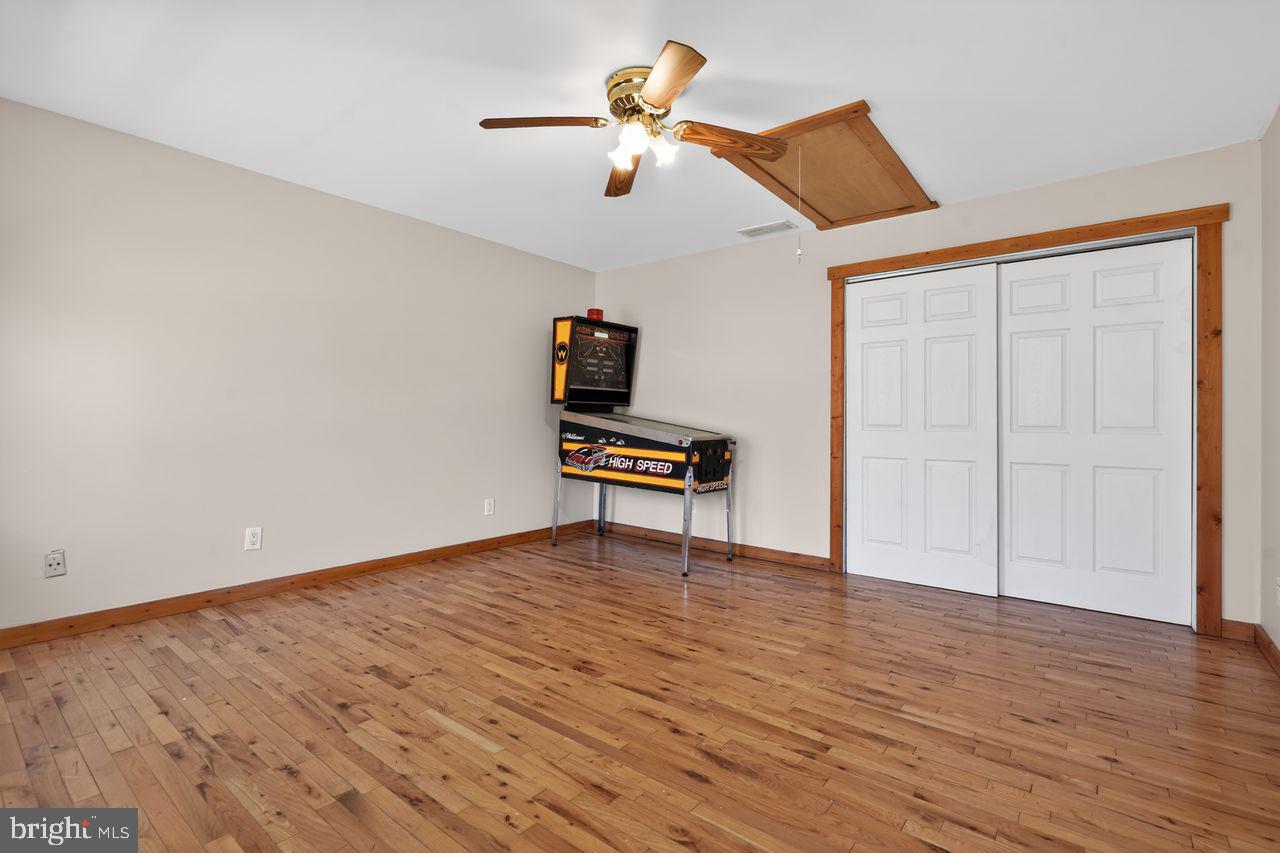 21 Mill Road Shamong, NJ 08088 - Photo 39 of 52 a view of an empty room with wooden floor