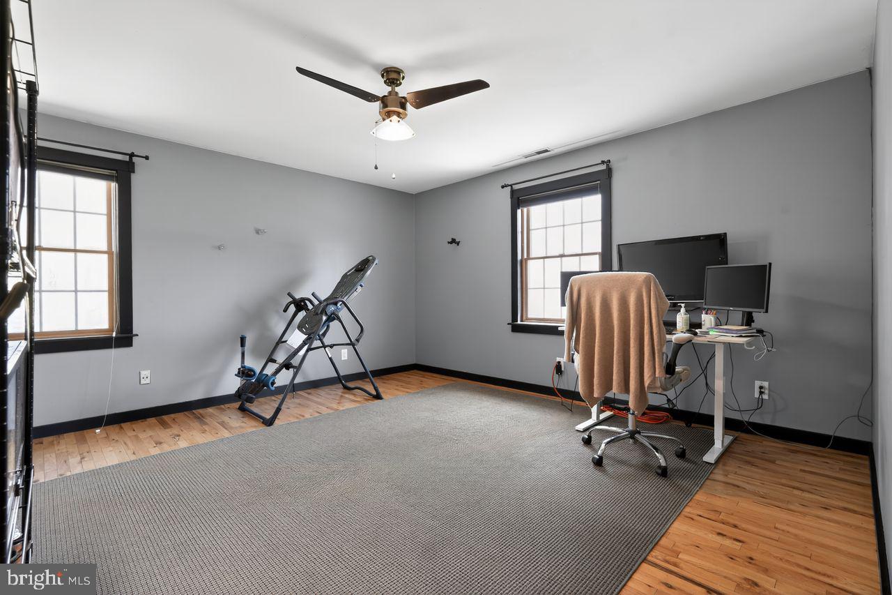 21 Mill Road Shamong, NJ 08088 - Photo 41 of 52 a view of a room with gym equipment and a window
