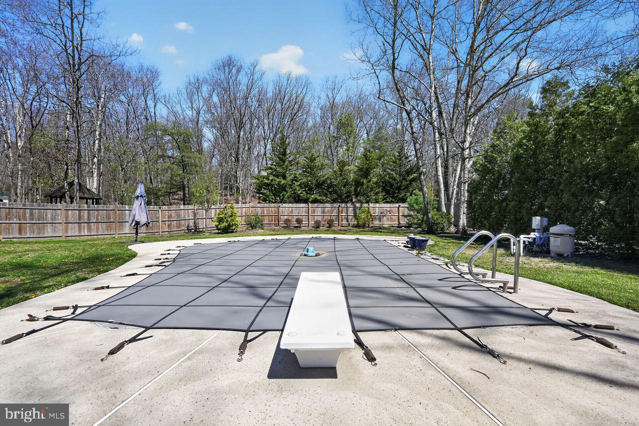 21 Mill Road Shamong, NJ 08088 - Photo 45 of 52 a view of a yard with swimming pool