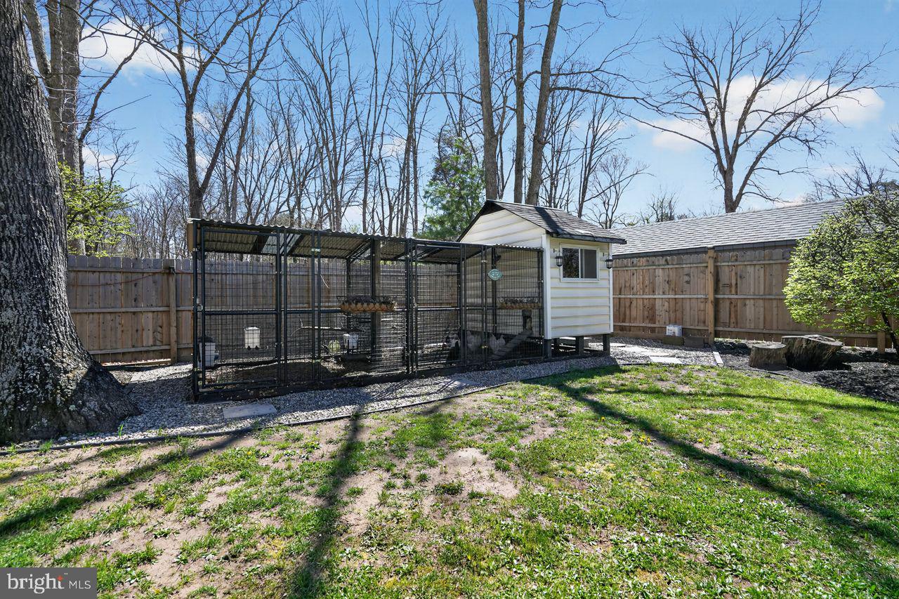 21 Mill Road Shamong, NJ 08088 - Photo 47 of 52 a view of a house with backyard and sitting area