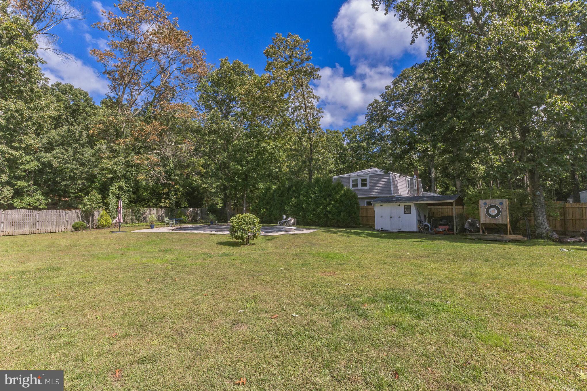 21 Mill Road Shamong, NJ 08088 - Photo 48 of 52 a house with trees in the background
