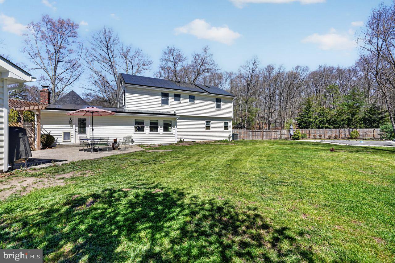 21 Mill Road Shamong, NJ 08088 - Photo 52 of 52 a view of a house with a yard porch and sitting area