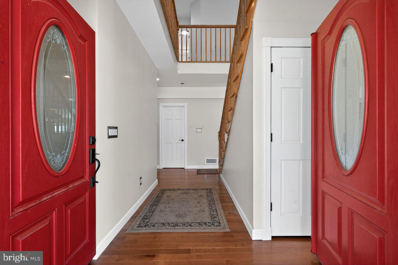 21 Mill Road Shamong, NJ 08088 - Photo 9 of 52 a view of an entryway with a mirror