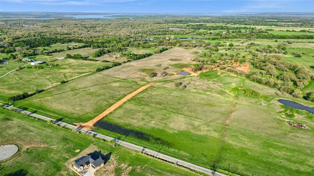 Lot 3 Rock Creek Road Gordonville, TX 76245 - Photo 4 of 30 a view of a field with an ocean