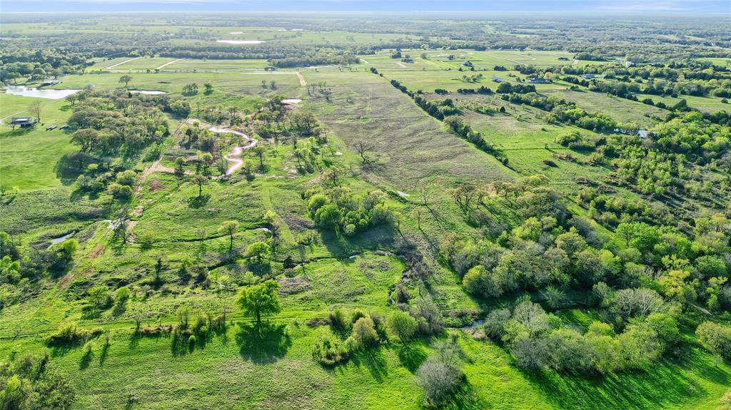 Lot 3 Rock Creek Road Gordonville, TX 76245 - Photo 8 of 30 a view of a yard with an outdoor space