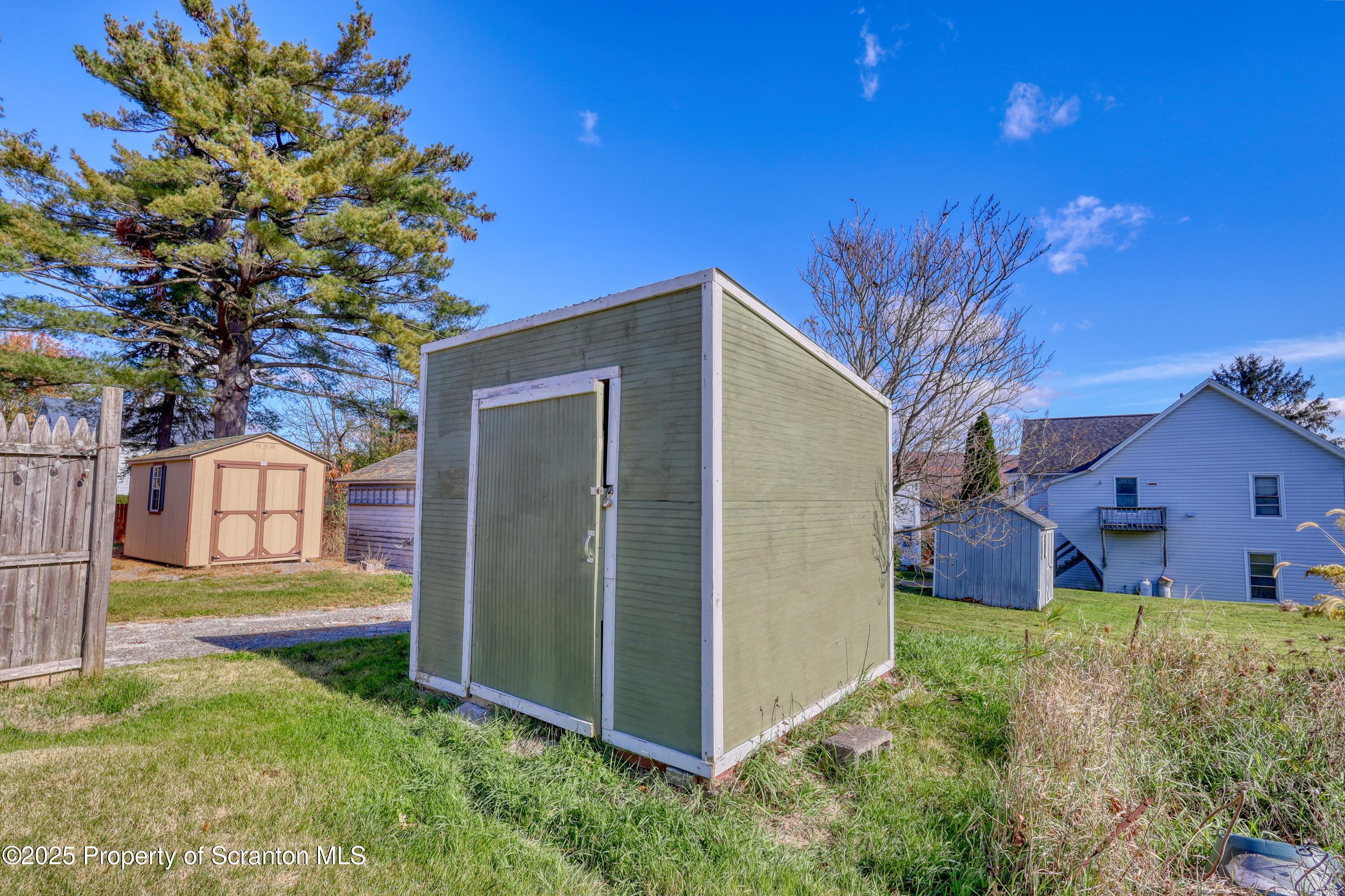 514 Hudson Street Forest City, PA 18421 - Photo 9 of 36 a front view of a house with garden