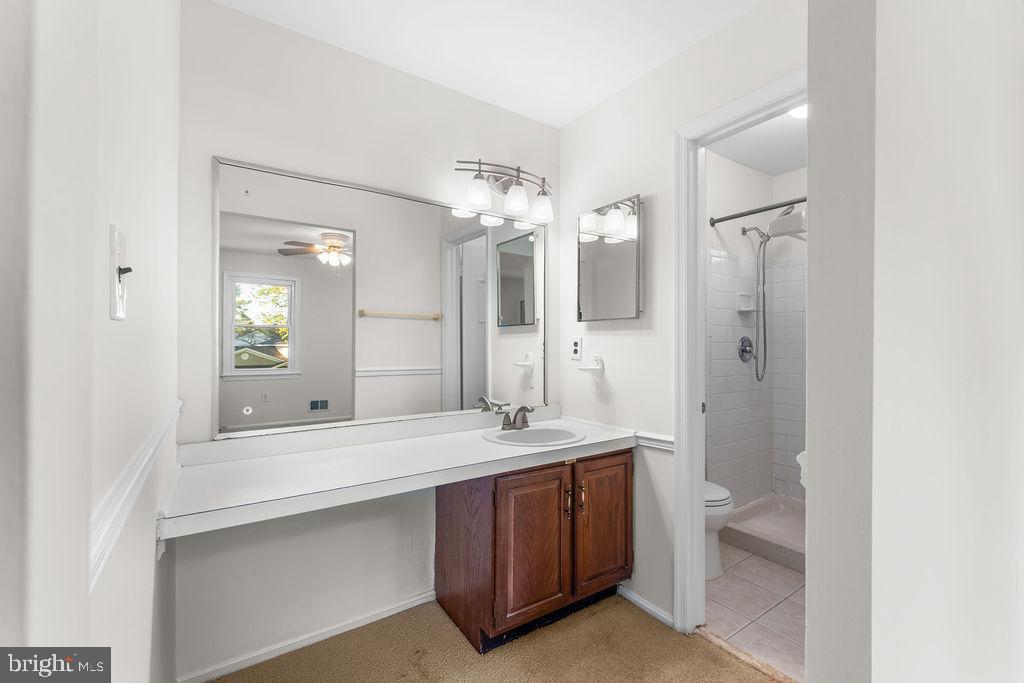 18324 Darnell Drive Olney, MD 20832 - Photo 12 of 25 Bright and airy bathroom with modern fixtures.