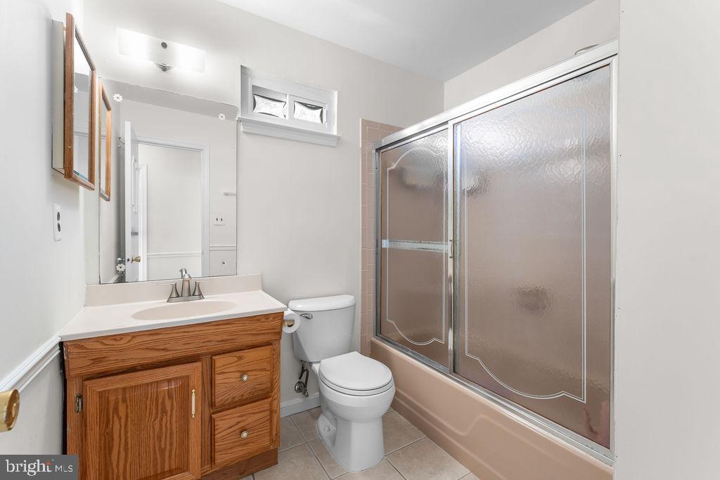 18324 Darnell Drive Olney, MD 20832 - Photo 14 of 25 Modern bathroom with sleek finishes.