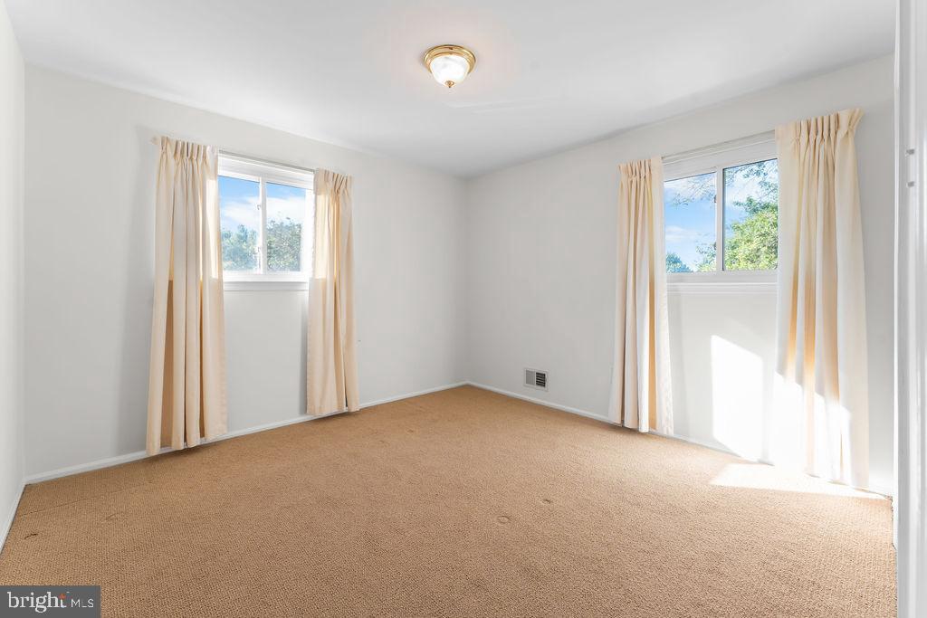 18324 Darnell Drive Olney, MD 20832 - Photo 16 of 25 upstairs bedroom with natural light.