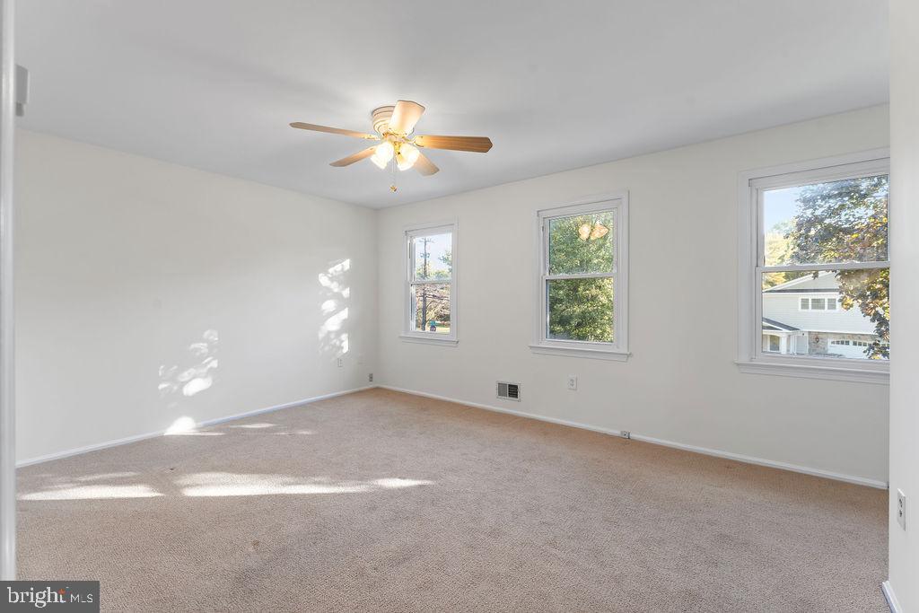 18324 Darnell Drive Olney, MD 20832 - Photo 9 of 25 Bright and primary bedroom with natural light.