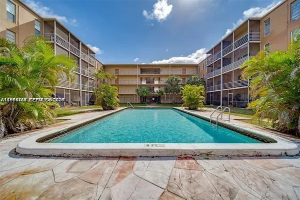 a view of outdoor space swimming pool and furniture