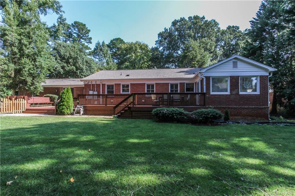 2908 Clover Road Charlotte, NC 28211 - Photo 2 of 27 a view of a house with a yard deck and a small cabin