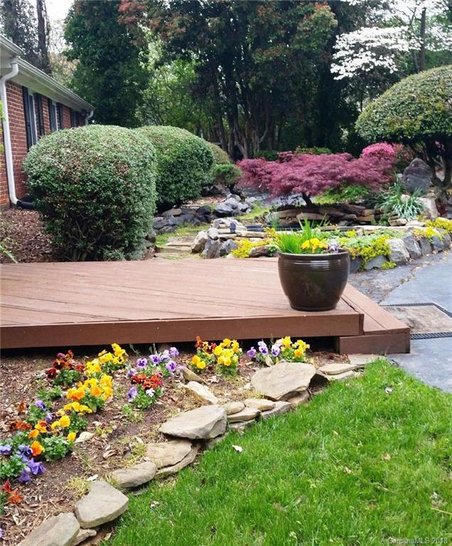 2908 Clover Road Charlotte, NC 28211 - Photo 24 of 27 a view of a backyard with plants