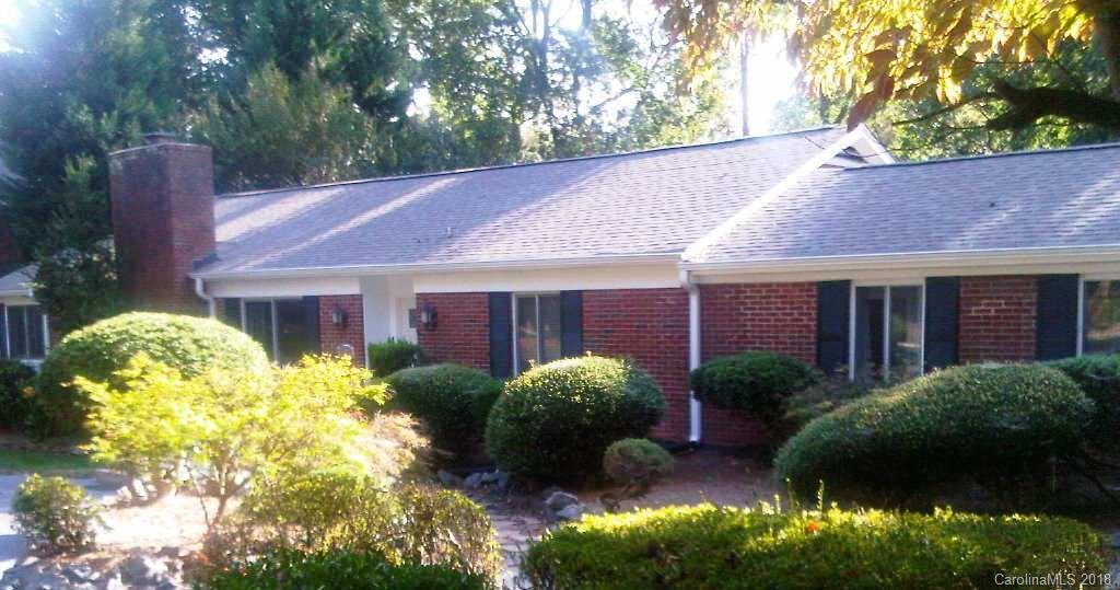 2908 Clover Road Charlotte, NC 28211 - Photo 25 of 27 a view of a house with a yard and plants