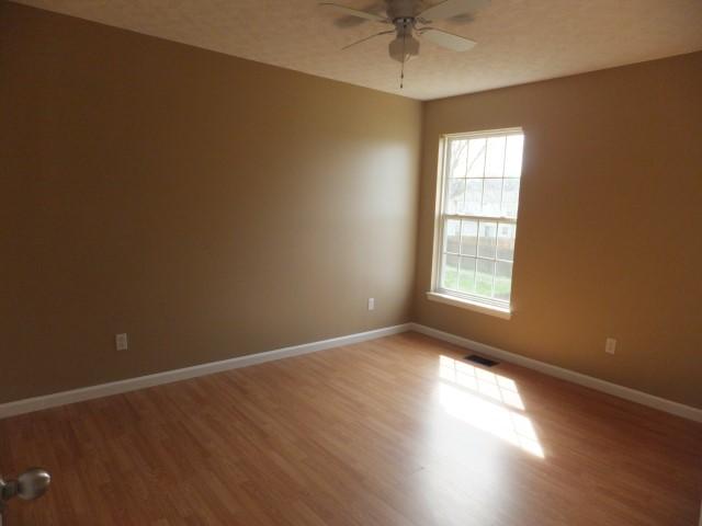 3631 Mahlon Moore Road Spring Hill, TN 37174 - Photo 11 of 15 an empty room with a window and a fan