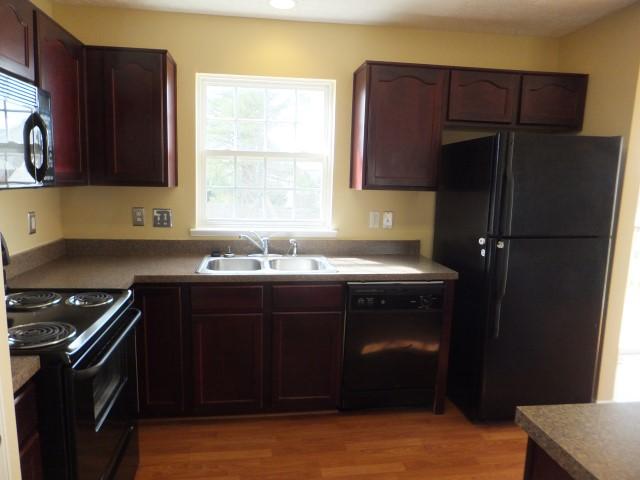 3631 Mahlon Moore Road Spring Hill, TN 37174 - Photo 6 of 15 a kitchen with a sink stove and refrigerator