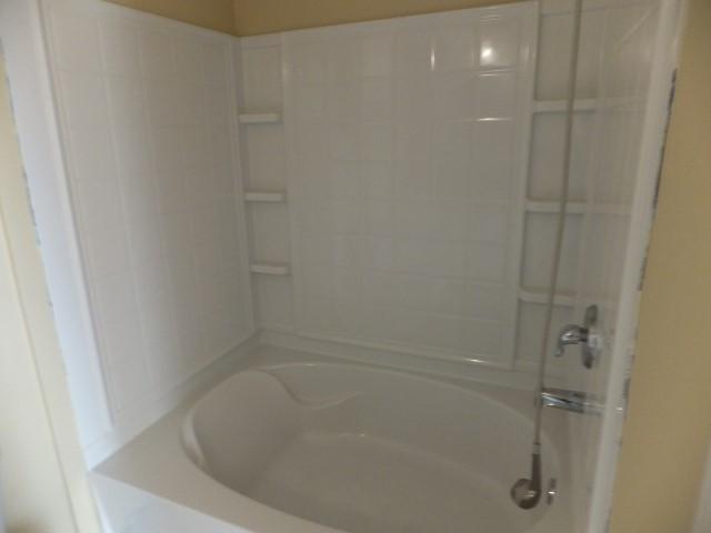 3631 Mahlon Moore Road Spring Hill, TN 37174 - Photo 9 of 15 a close view of a bathtub in bathroom