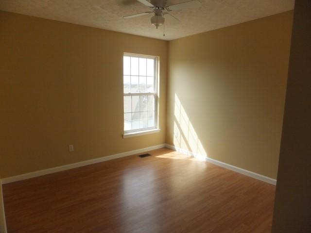 3631 Mahlon Moore Road Spring Hill, TN 37174 - Photo 10 of 15 an empty room with a window and a ceiling fan