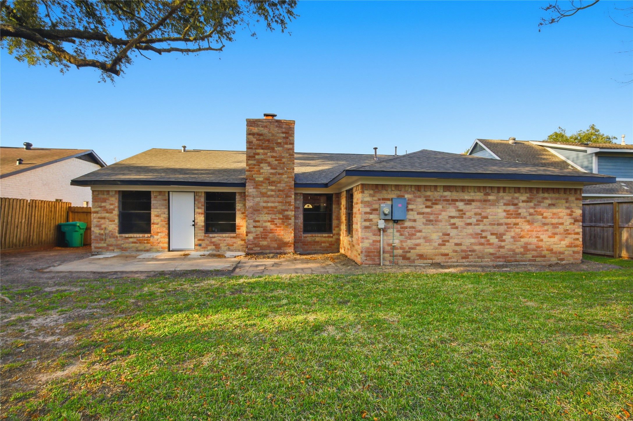 9850 Sageroyal Lane Houston, TX 77089 - Photo 17 of 18 a front view of a house with a yard