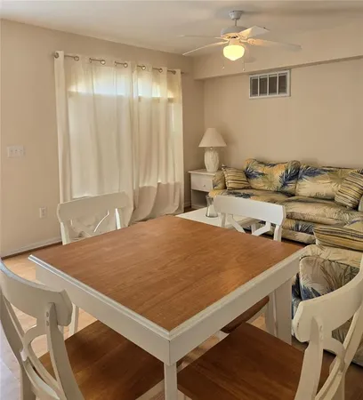 a bed room with a bed and a table