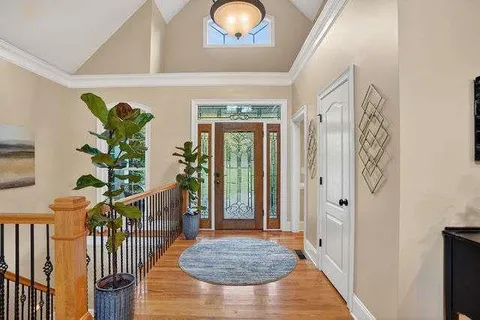 a view of entryway with wooden floor