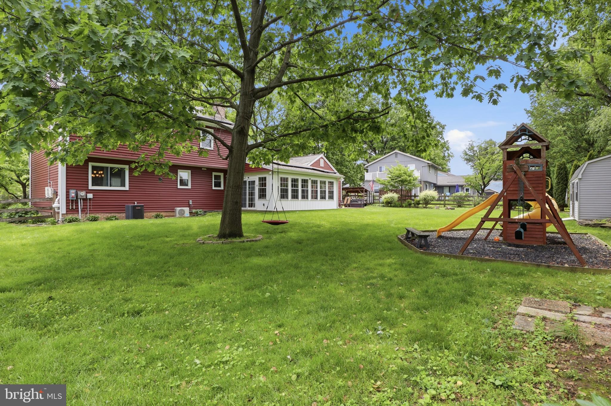 1072 Lambley Road Landisville, PA 17538 - Photo 19 of 46 a view of a house with backyard and a tree