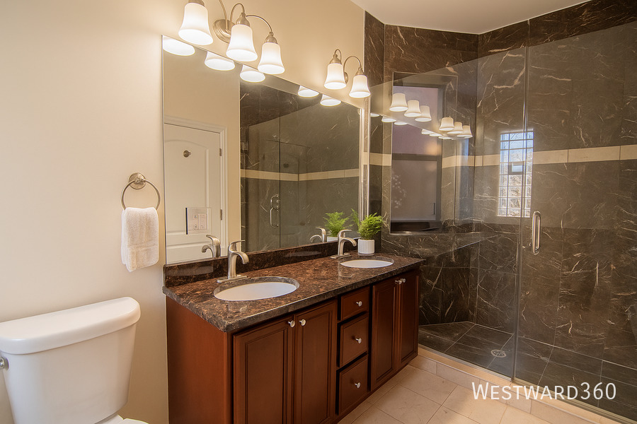 5172 South Michigan Avenue, Unit 1 Chicago, IL 60615 - Photo 13 of 14 a bathroom with a sink a toilet and shower