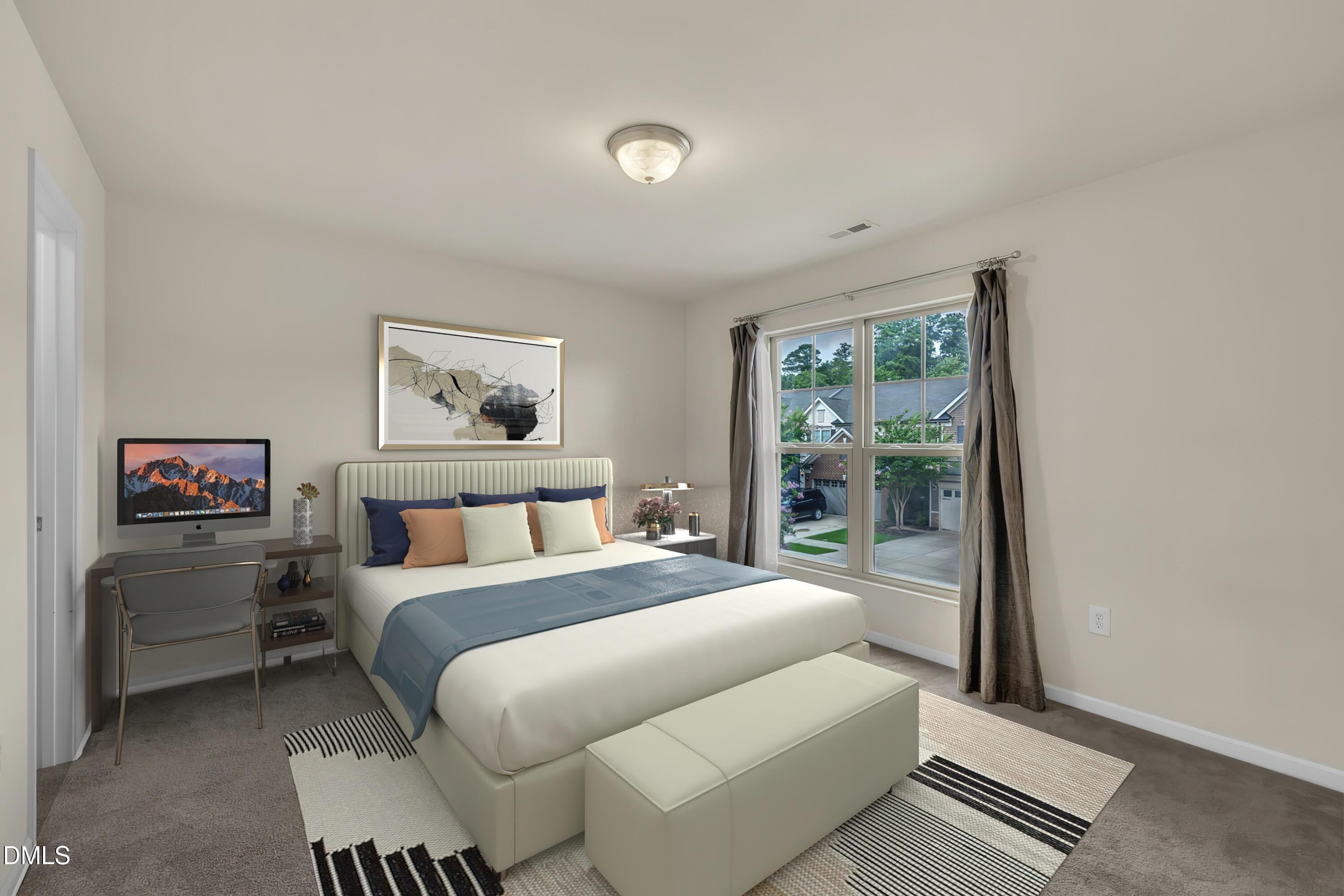 519 Brier Crossings Loop Durham, NC 27703 - Photo 26 of 36 a bedroom with a large bed and a painting on the wall