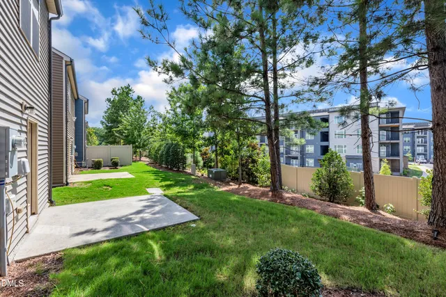 a view of a backyard with garden