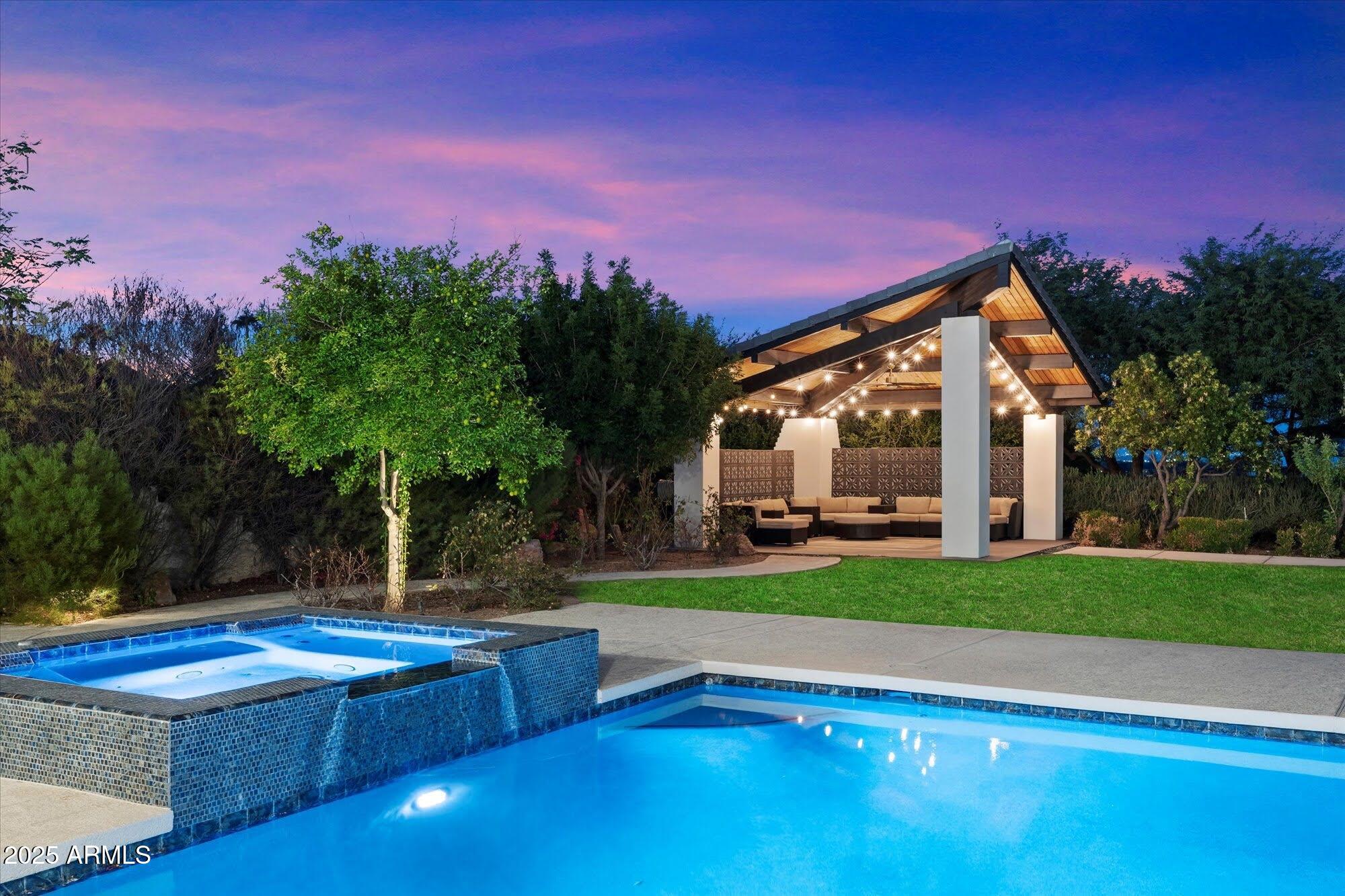 5226 East Desert Vista Road Paradise Valley, AZ 85253 - Photo 28 of 49 a view of a house with swimming pool and a yard