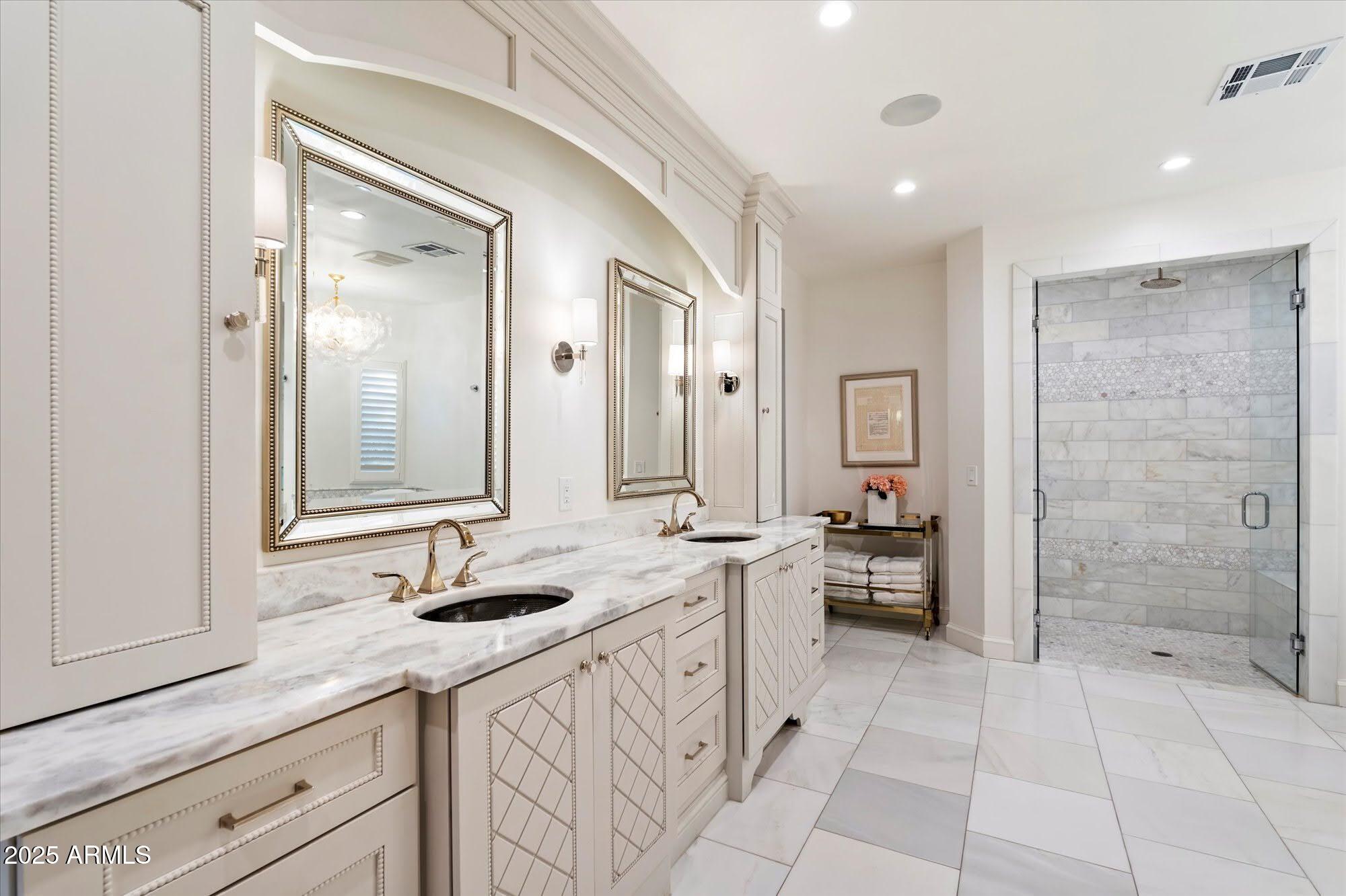 5226 East Desert Vista Road Paradise Valley, AZ 85253 - Photo 35 of 49 a spacious bathroom with a granite countertop sink mirror and shower