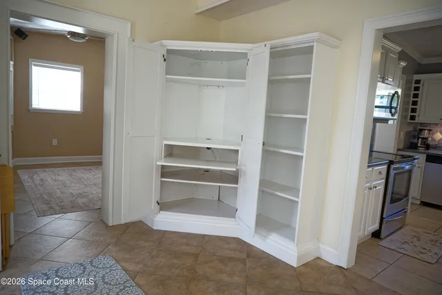 a bathroom with a toilet a sink and shower