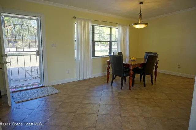 a kitchen with stainless steel appliances granite countertop a refrigerator sink and cabinets