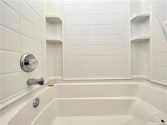 15962 M Street, Unit A Mojave, CA 93501 - Photo 16 of 21 a bathroom with a tub